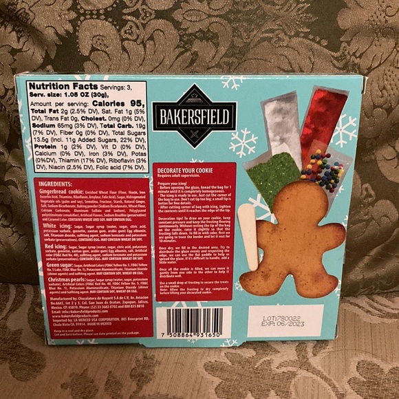 Gingerbread gift tin. Contains a gingerbread ornament and cookie decorating kit. - Picture 7 of 8